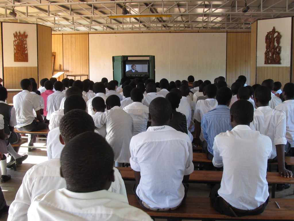 Andiamo Secondary School students watching the movie "Hotel Rwanda" as part of their lesson on conflict resolution