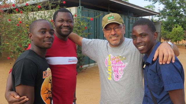 Alleluya band members welcoming Gio when he arrived in Malawi